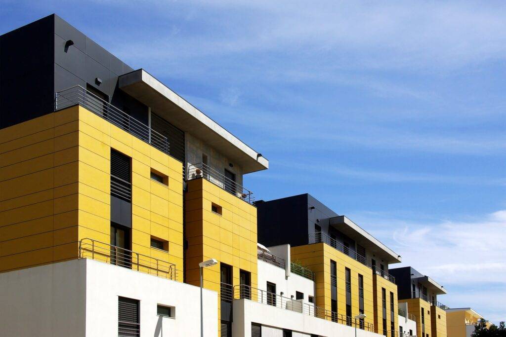 Facade of a modern apartment condominium in a sunny day