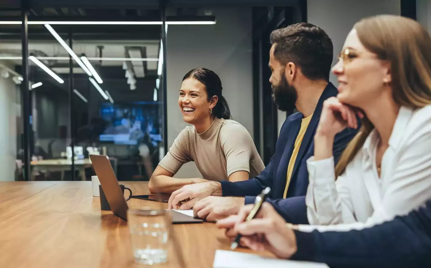 laughing colleagues at desk